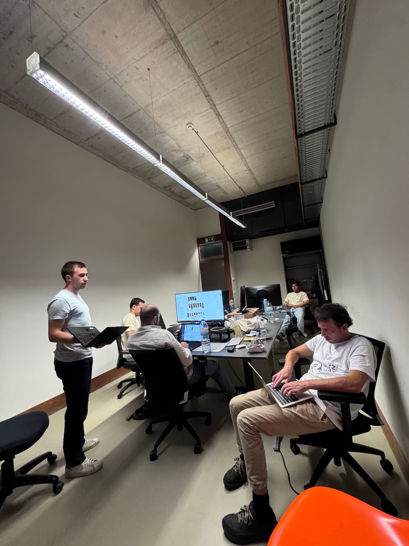 a late night in the office, screens still on